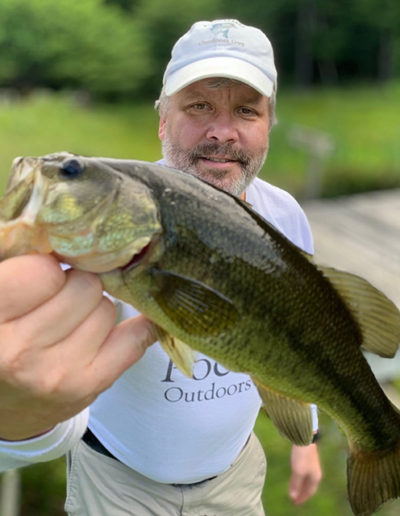 Pocono Outdoors Guy with a Largemouth Bass